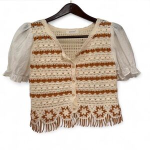 Boho/indie womens crotchet top with puffy sleeves and fringe detail